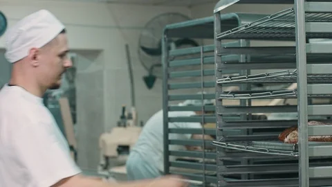 Cook smells freshly baked bread Видео 92581230