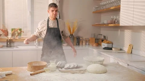 Cook Sprayed Flour In The Kitchen Stock Footage 273499914