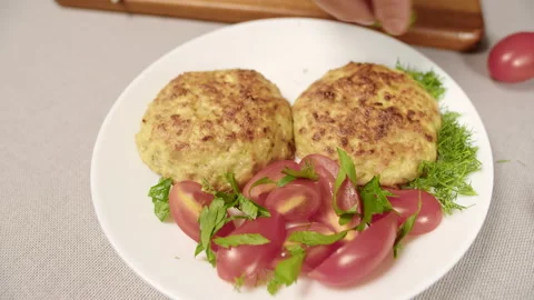 Cook sprinkles cutlets with dill Stockbeeldmateriaal 162107736