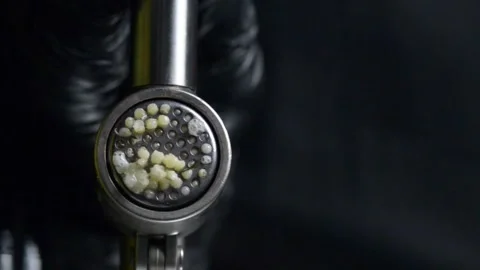 The cook squeezes out garlic. Vertical video Stock Footage 248817185