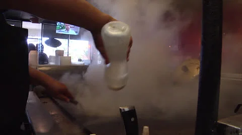 Cook steaming Hibachi Grill surface Video stock 25912608