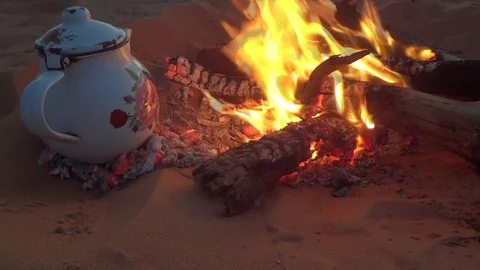 Cook the tea on fire Stock Footage 129523900