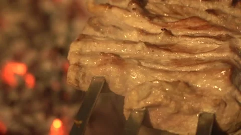 The cook turns the meat on the grill Stock Footage 154887155
