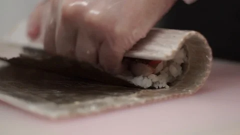 Cook twists rolls on the mat Stock Footage 106670529