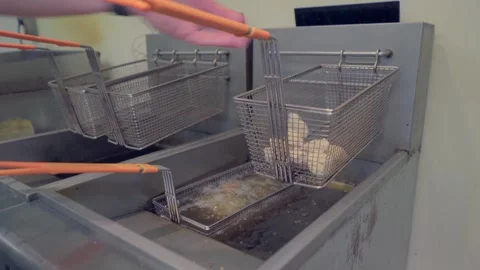 Cook Using A Deep Fryer To Make Chicken In A Kitchen Video stock 320085361