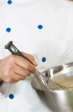 Cook whisking Foto stock
