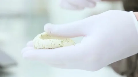 Cook in white gloves makes snacks Stock Footage 61926830