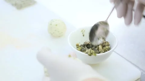 Cook in white gloves makes snacks Stock Footage 61926843