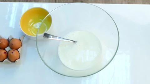 The cook will mix the dough. Fast moving. Video stock 86124650