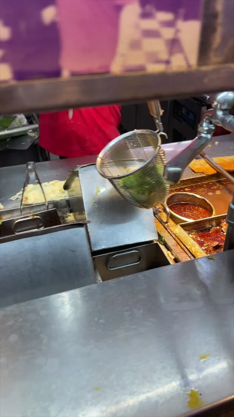 A Cook Working Behind The Counter Of A Beef Noodle Soup Stall Video stock 342828876