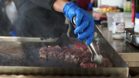 Cook working in a restaurant Stock Footage 291902148