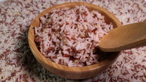 Cooked and raw mixed low glycaemic index healthy rice  Stock Footage 149457715