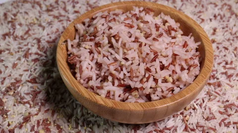 Cooked and raw mixed low glycaemic index healthy rice  Stock Footage 149457822