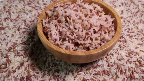 Cooked and raw mixed low glycaemic index healthy rice  Stock Footage 149457923
