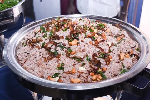 Cooked and raw mixed low glycaemic index healthy rice grain basmati millet .. Stock Photos