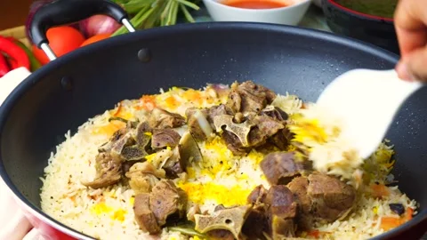 Cooked arab mandi rice in the pan Stock Footage 133620534
