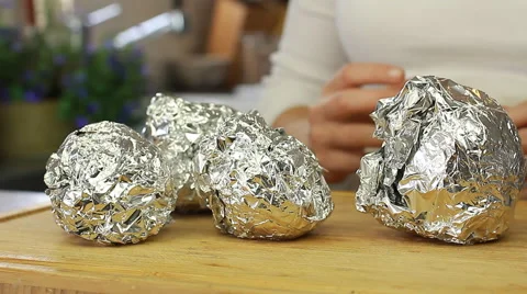 Cooked baked beetroot beets in an aluminium foil Stock Footage 68695846