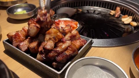 Cooked BBQ Pork Belly from Hot Grill - 4K Stock Footage 248939703