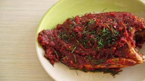 Cooked beef steak with herbs on a plate Stock Photos