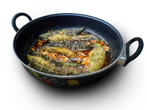 Cooked bitter gourd in a pan with thread wrap or mash of bitter gourd Stock Photos