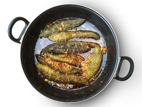 Cooked bitter gourd in a pan with thread wrap or mash of bitter gourd top vie Stock Photos