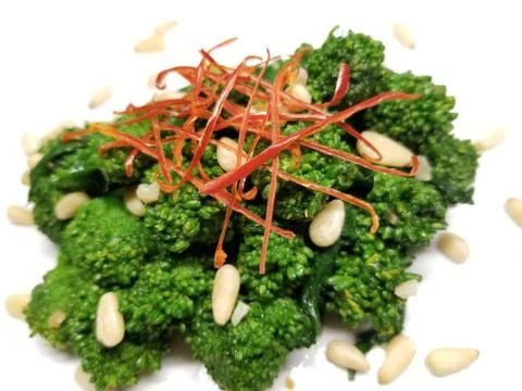 Cooked Broccoli on a White Background Stock Photos