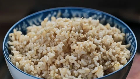 Cooked brown rice close up Vidéo 159575853
