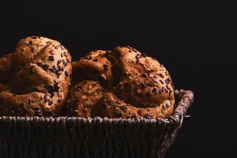 Cooked buns on dark background. Breakfast Stock-Fotos