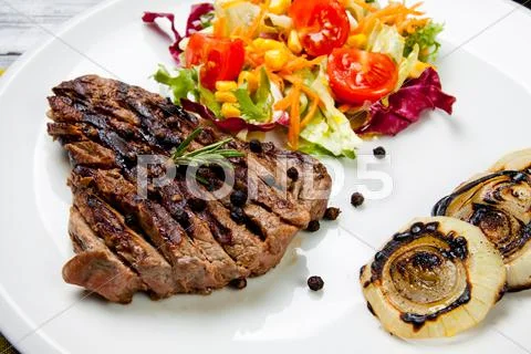 Cooked cut of meat Stock Photos