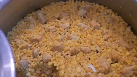 Cooked Egg Barley with Meat in Pot, Hungarian Traditional Food Close-Up Stock Footage 337400953