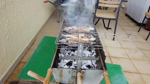 Cooked Fish Removed from BBQ Grill Vidéo 332815793