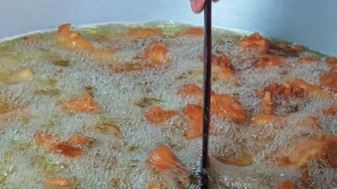 Cooked fried bananas in a pan Stock Footage 304437010