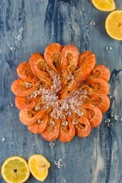 Cooked giant prawns on a blue background. Stock-Fotos