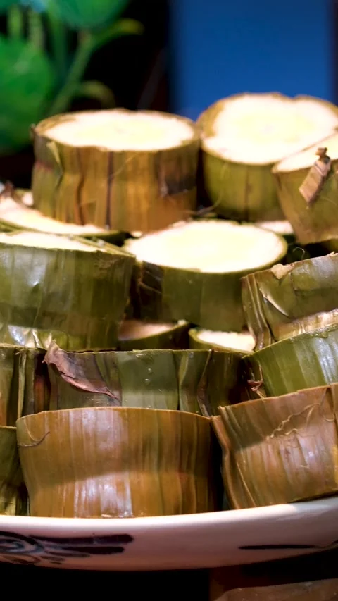Cooked glutinous rice cake, Vietnamese new year food tet buffet Vietnam New Year Stock Footage 286081901