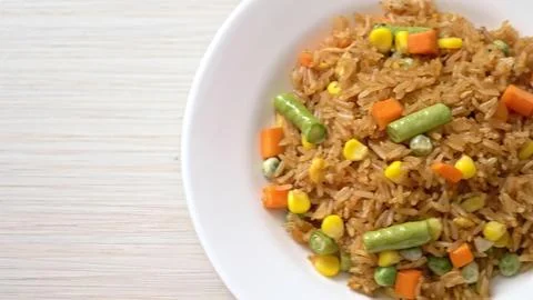 Cooked ground beef with mixed vegetables on white plate Stock Photos