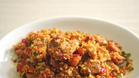 Cooked ground beef with vegetables served on a white plate Stock Photos