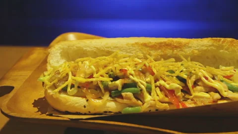 Cooked hamburger rotates on the table. Stock Footage 93217626