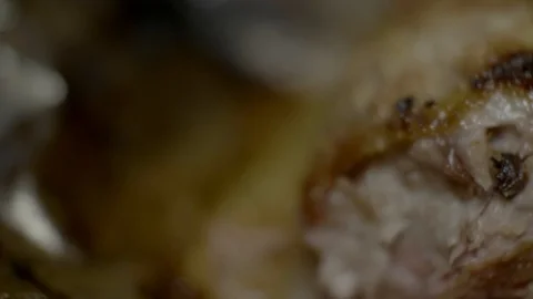 Cooked hog roast pulled pork on a large metal serving tray close up 4K Vídeo Stock 86435163