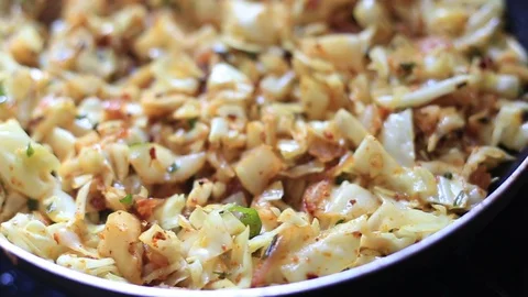 Cooked hot cabbage pieces curry Video stock 129529199