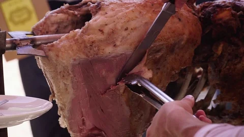 Cooked lamb on a spit Video stock 119941299