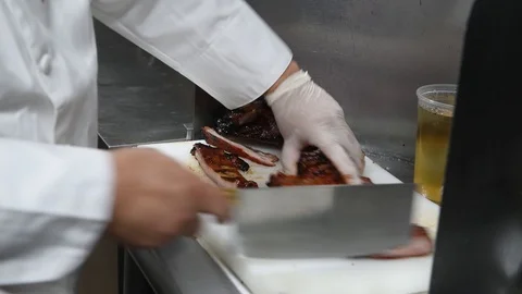 Cooked marinade pork ribs ready for serve on restaurant kitchen Stock Footage 117551007