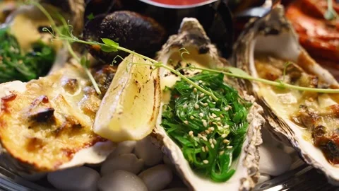 Cooked mixed seafood set, lobster shrimp, king prawns, mussels, oysters and Stock Footage 158102304