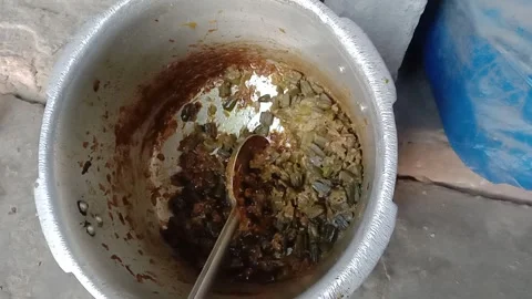 Cooked Okra Vegetable Curry in a Pressure Cooker Stock-Footage 347366092