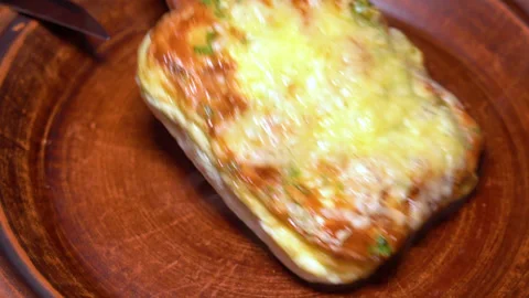 Cooked omelet with vegetables on a plate Stock Footage 249285855
