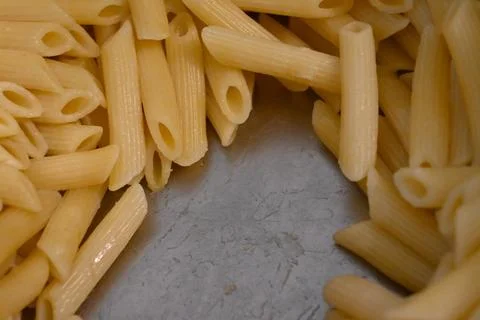 Cooked penne pasta Photos