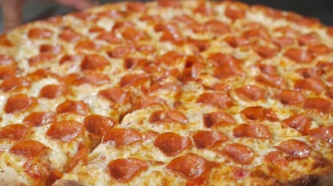 Cooked Pepperoni Pizza Closeup Steaming Commercial Industrial Stone Oven Video stock 66075039
