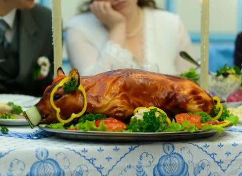 Cooked pig on plate Stock Photos
