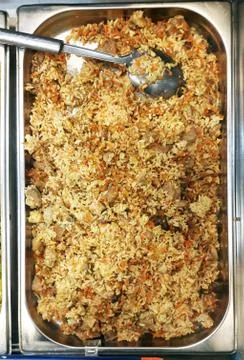 Cooked pilaf in the tray Stock Photos