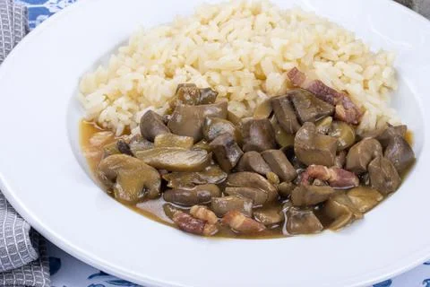 Cooked pork kidneys and white rice Stock Photos