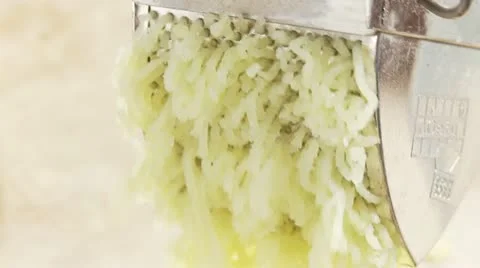 Cooked potatoes being mashed (close up) Stock Footage 24643013